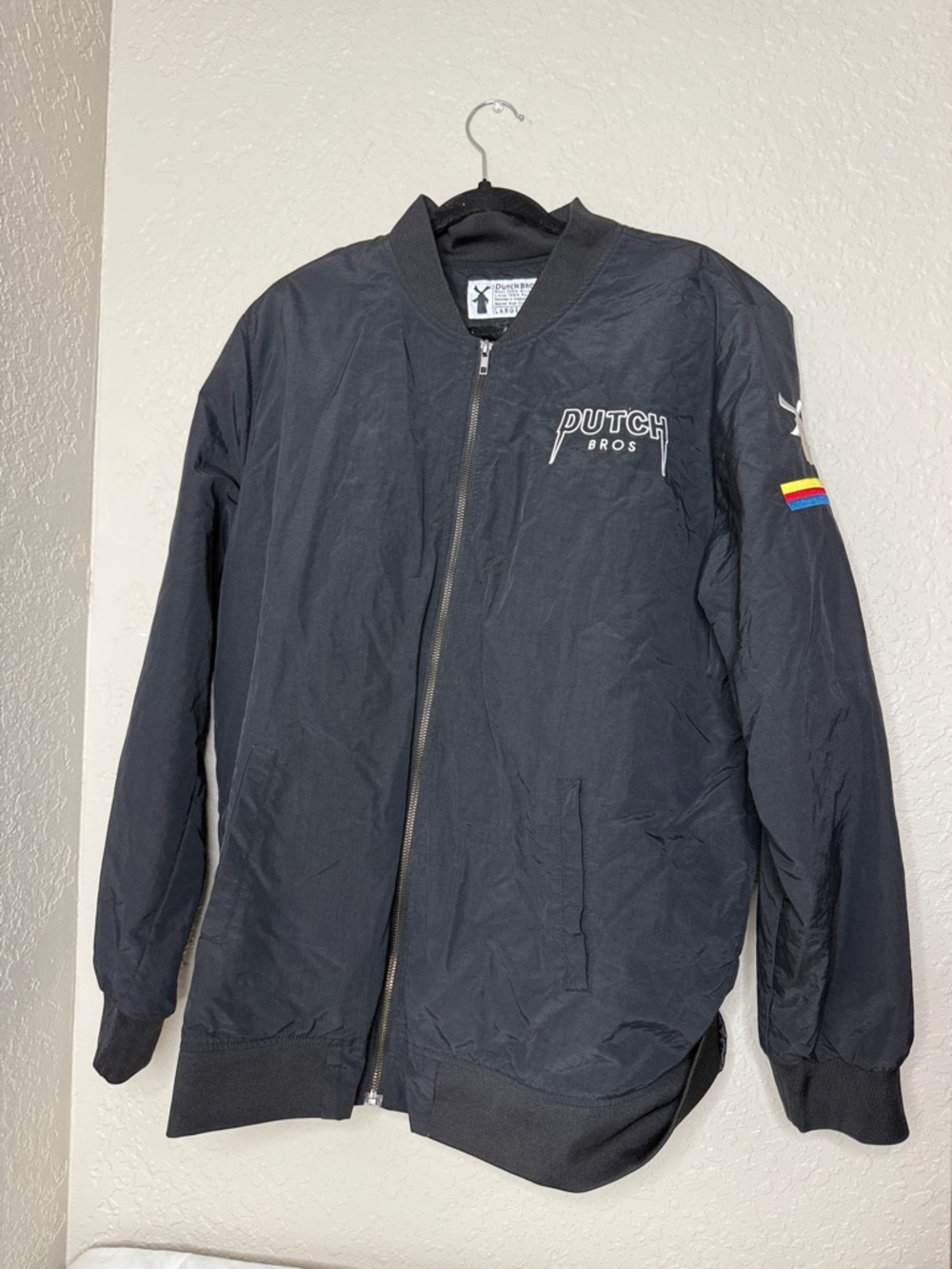 Never worn Dutch Bros Black Bomber Jacket with Sleeve Patch